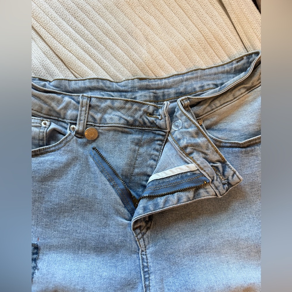 Custom Patchwork Light Wash Denim Jeans with Abstract Appliqué - Picture 4 of 7
